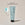 A tube of ACURE Simply Smoothing Shampoo  next to a circle displaying old branded packaging and text calling out: New look , same proven formula